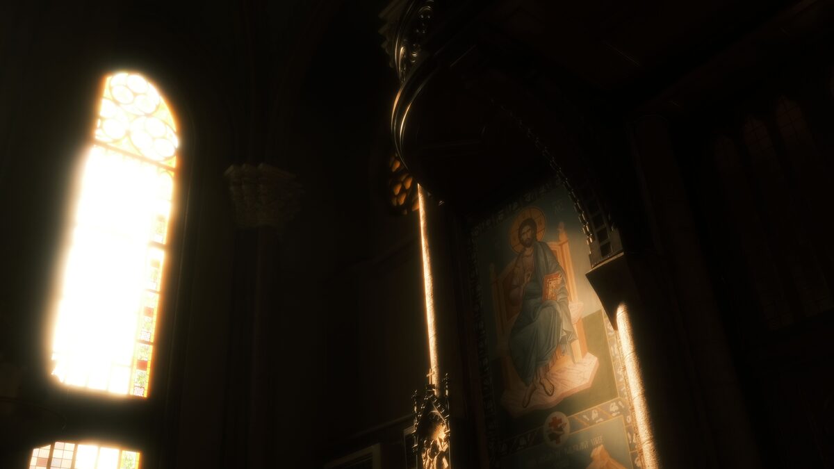 The interior of a church sanctuary with soft light and empty pews before a service