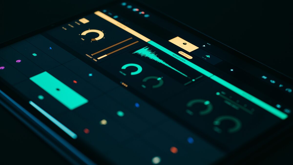 a tablet screen showing an audio waveform being edited