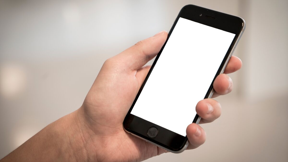 a hand holding a modern smartphone