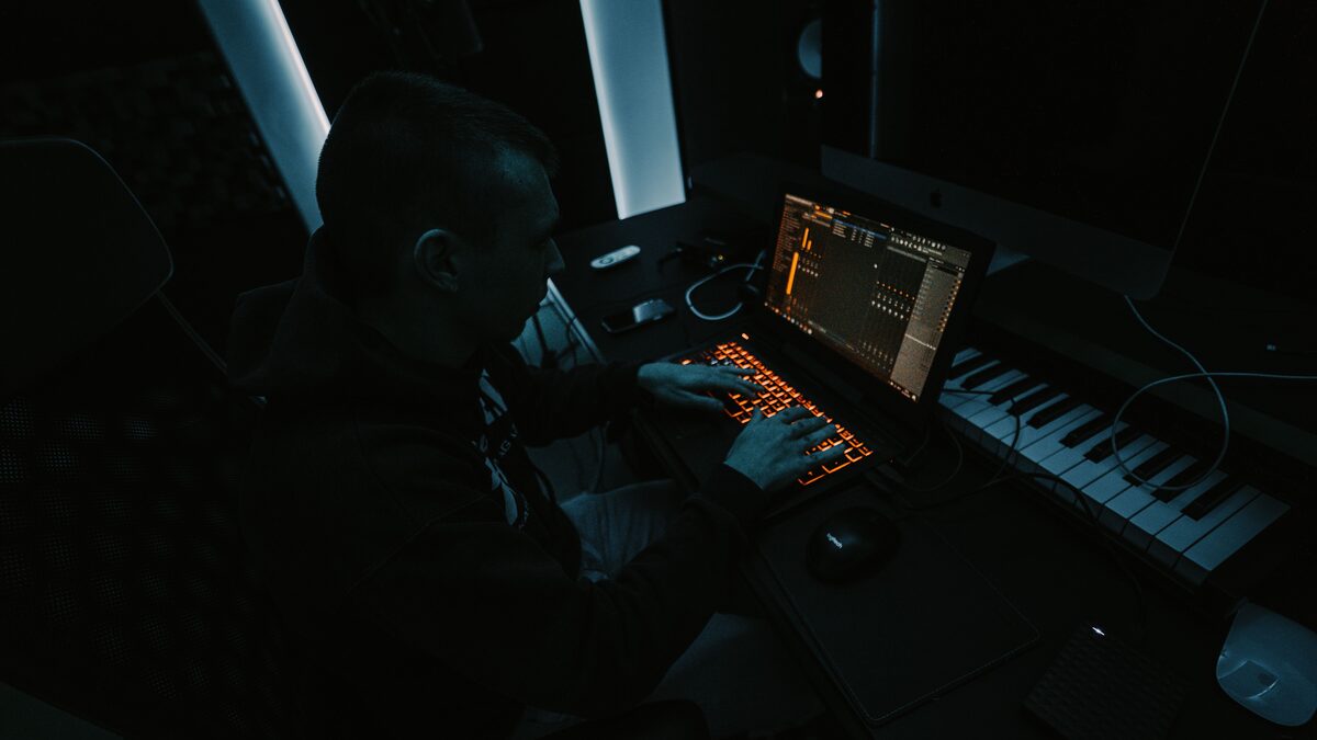 Music producer composing tracks, illustrating a Soundraw review