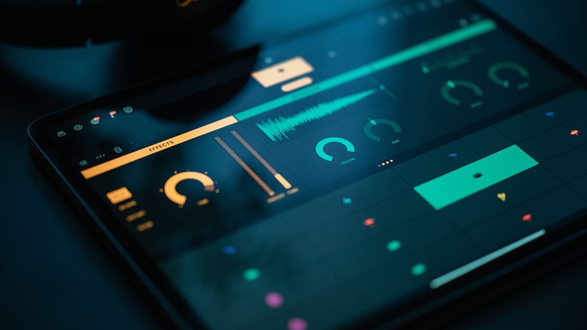 A close-up of audio files and a waveform on a computer screen